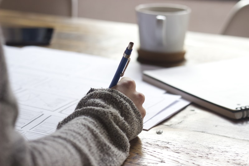 Researcher analyzing data and documents for social impact research